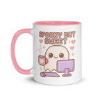 Cute pixel art ghost mug with pink handle and text “Spooky But Sweet